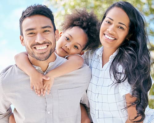 Happy Family Spending Time Together Outside Their House in Florida